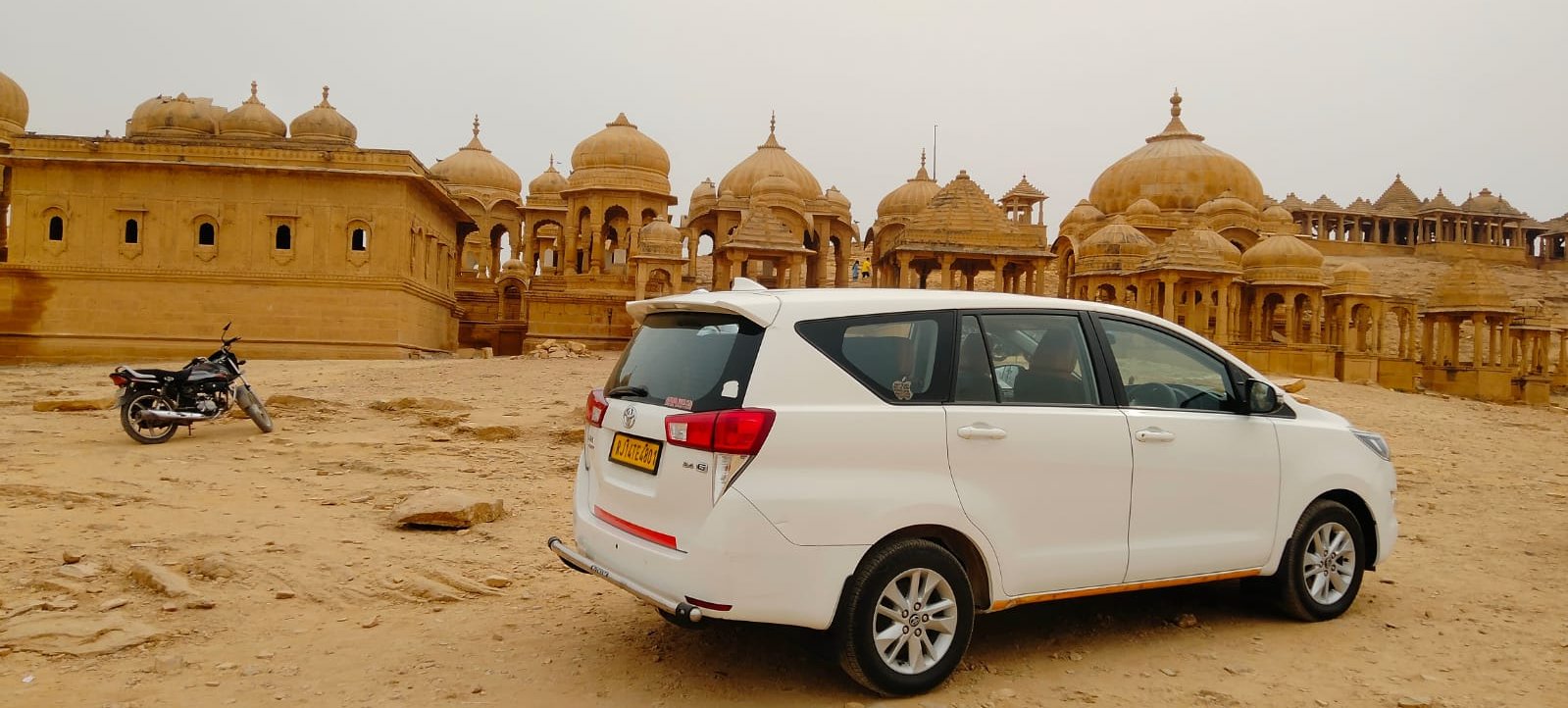 Innova Crysta at Jaisalmer Fort - The Fast Tour and Travels